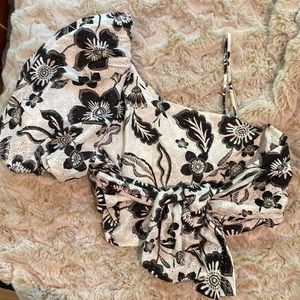 Asymmetrical puff sleeve crop top from Anthropologie